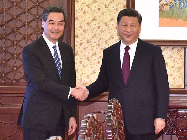 習近平: 中央政府充分肯定梁振英和特區政府的工作a